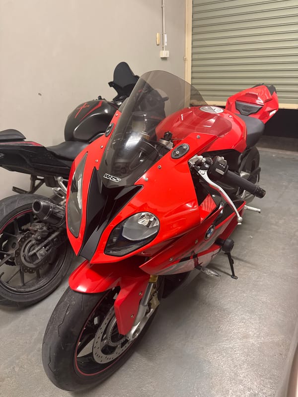 Sport bikes, Sphynx cats, and a nighttime pool at home