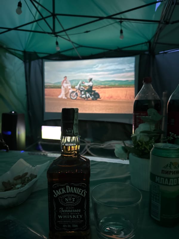 Indoor gathering documented with whiskey and Bulgarian beverage in Kyustendil