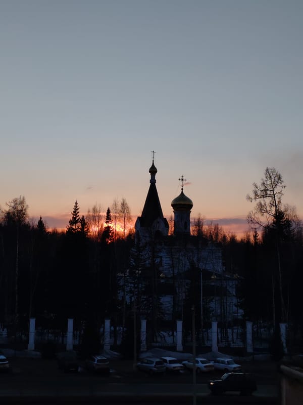 Orthodox church photographed at sunset in Ust-Ilimsk, Russia