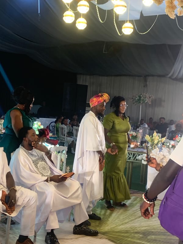 Wedding reception held in decorated event hall in Jos
