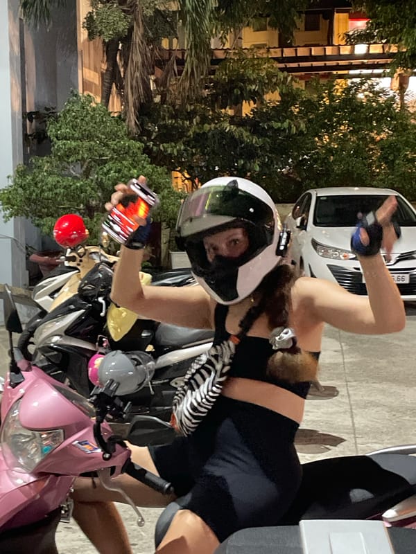 Night ride on a pink scooter through Nha Trang