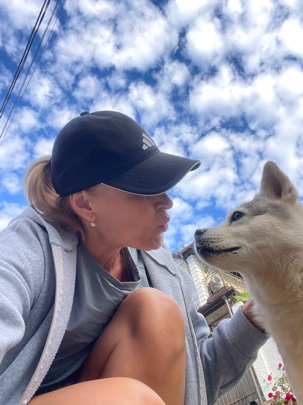 Woman takes selfies, pets husky in early morning Baranovka