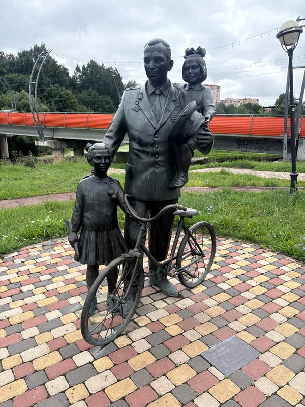 Gagarin statue and algae-covered canal in Sverdlovskiy