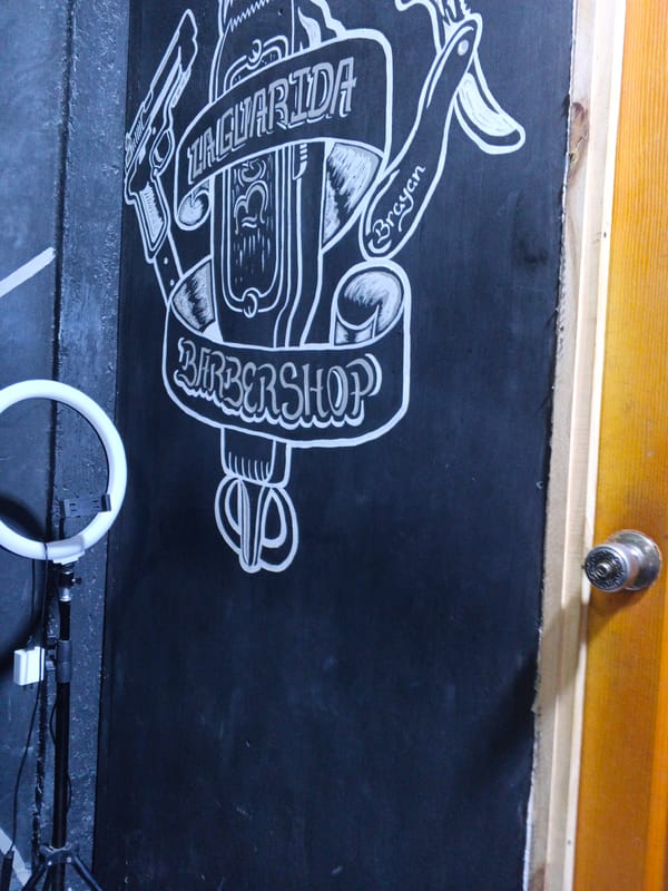 Evening barbershop activity documented in Altagracia, Venezuela