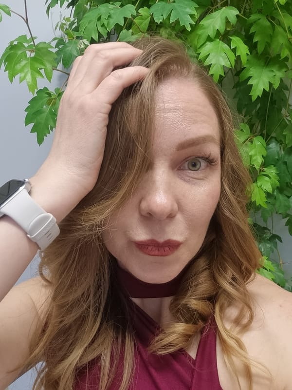Woman takes selfies in Kemul locker room