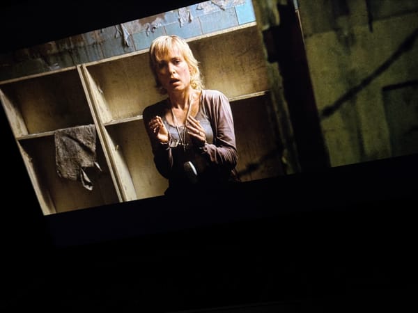Movie scene displayed on screen in Plovdiv room