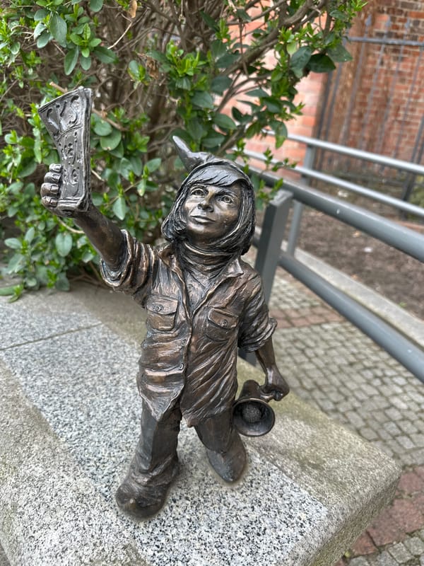 Tourist documents Wrocław's bronze dwarfs, love locks, historic churches