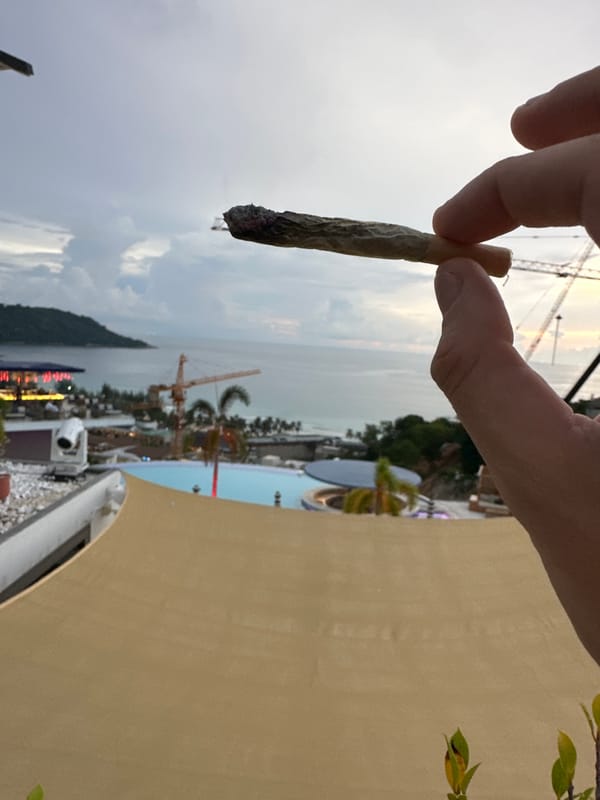 Rooftop pool day in Karon with coastal views and chill energy