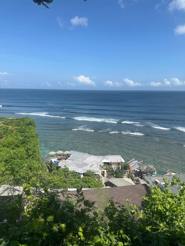 Surfers spotted in early morning waters off Kuta Selatan