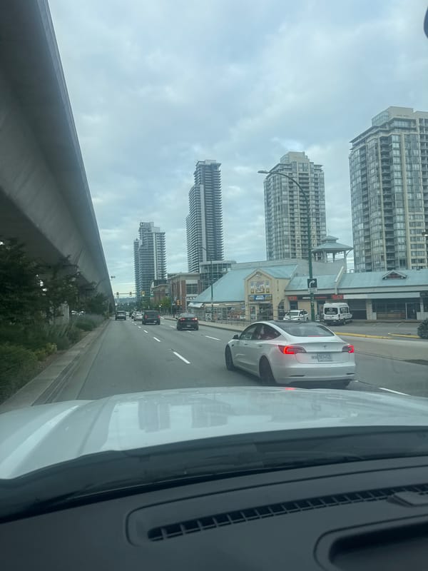 Street-level view from a moving car in Burnaby