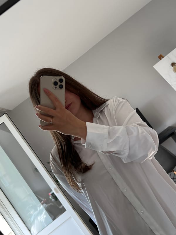 Woman takes early morning selfies in Ternopil, Ukraine