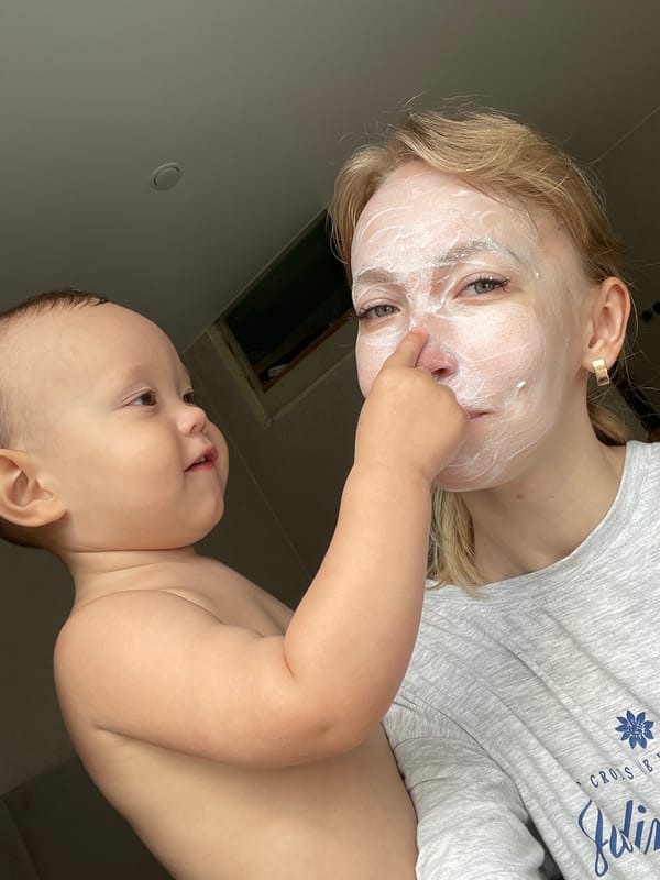 Mother and baby share quiet morning moments in Perm home
