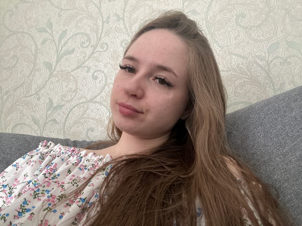 Woman photographed resting indoors from overhead angles