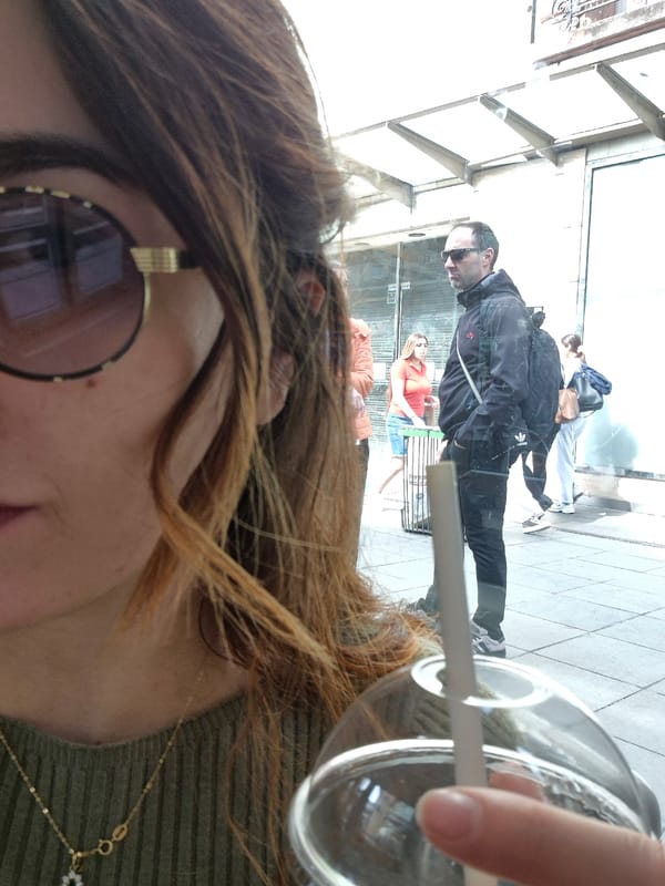 Tourist documents morning cafe visit, street scenes in Strasbourg