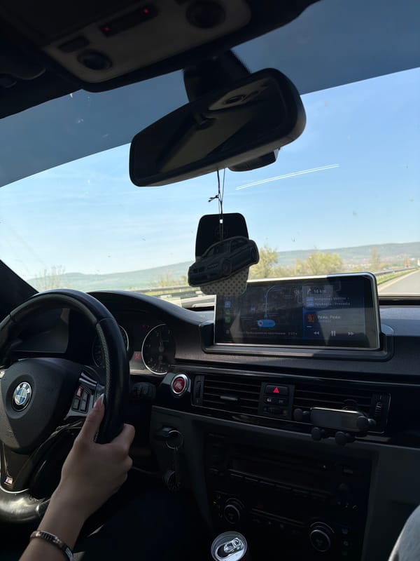 Driver uses GPS navigation in BMW near Devnya, Bulgaria