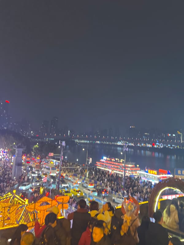 Traditional costume activities documented at Chongqing's Hongyadong tourist area