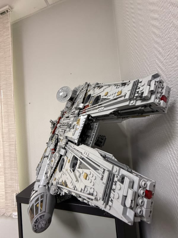 LEGO Millennium Falcon model displayed on wall in Krasnoyarsk