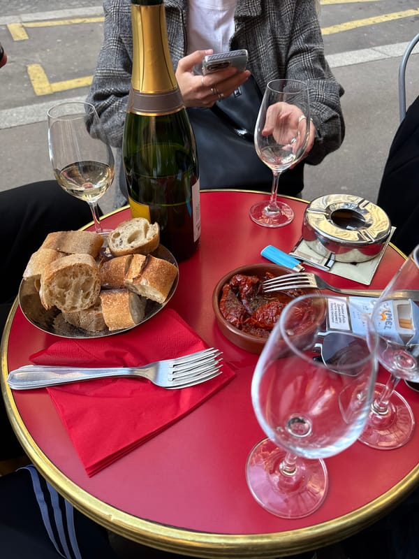 Parisian cafe scene captured during evening dining hour