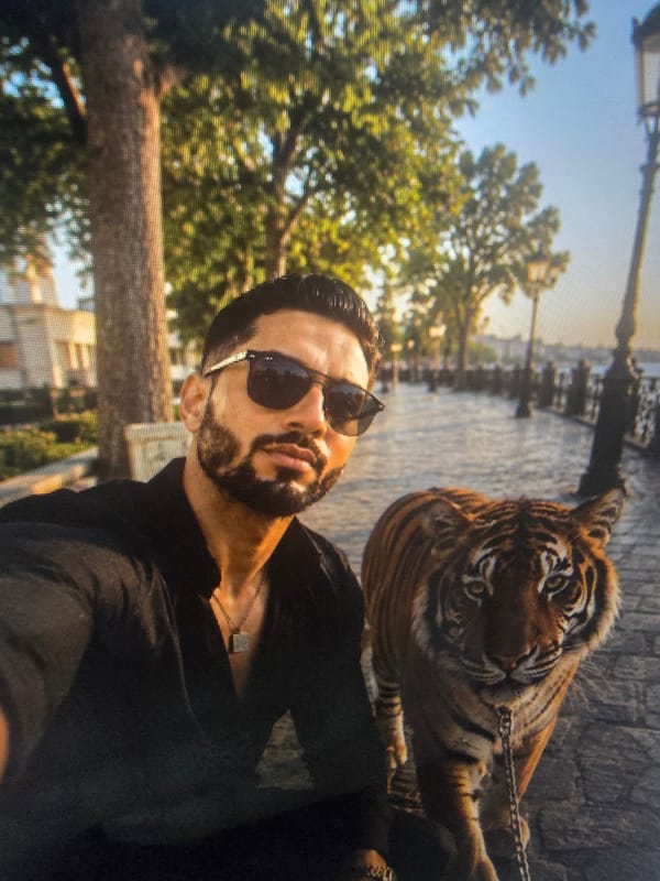 Chilling with a tiger across boats, helicopters, and snacks