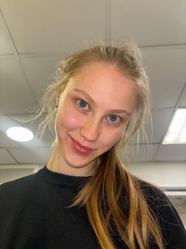 Woman takes selfie indoors in Perm, Russia