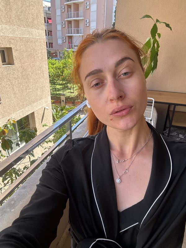 Woman Takes Morning Selfies on Budva Balcony