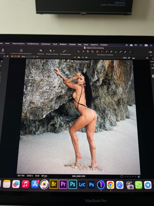 Photo editor processes swimwear photography in Kazan studio session