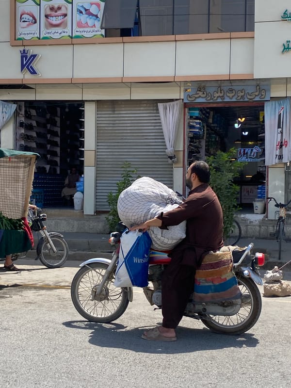 Street life and transit on a Kandahar road
