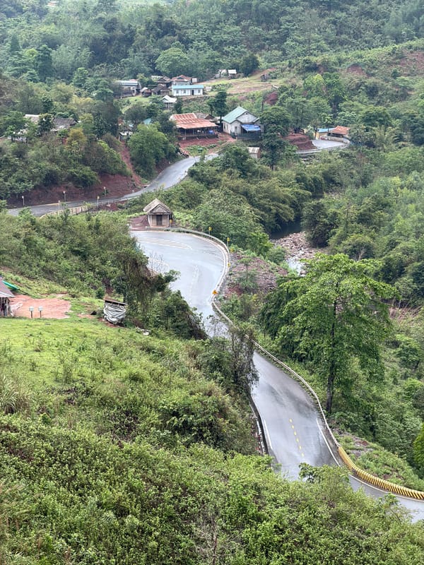 Motorcyclist Documents Mountain Road Journey Through Rural Vietnam