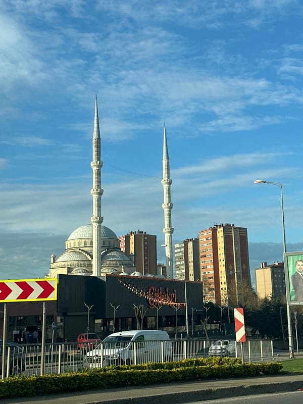 Mosque silhouetted against morning sky in Ataşehir, Turkey
