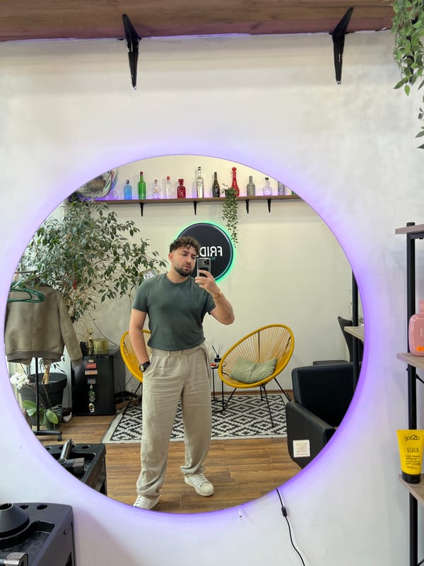 Man takes selfie in illuminated mirror in Sofia