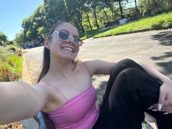 Couple enjoys afternoon park outing with dog in Tsarevo