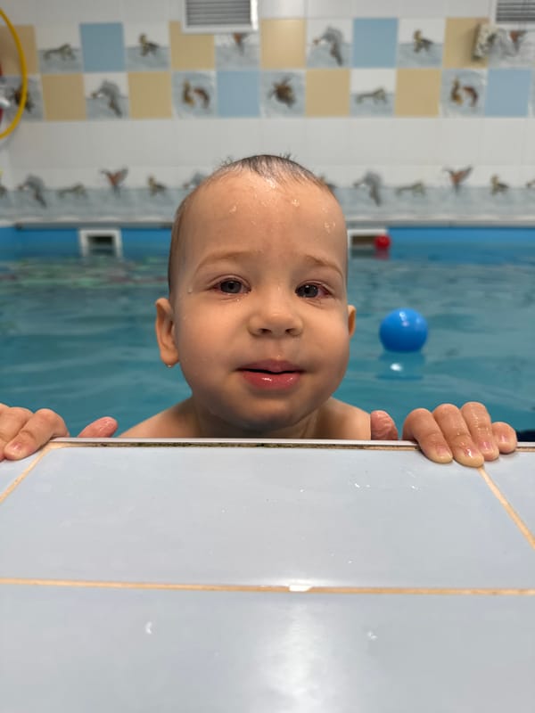 Child enjoys early morning swim session in Rusanovo pool