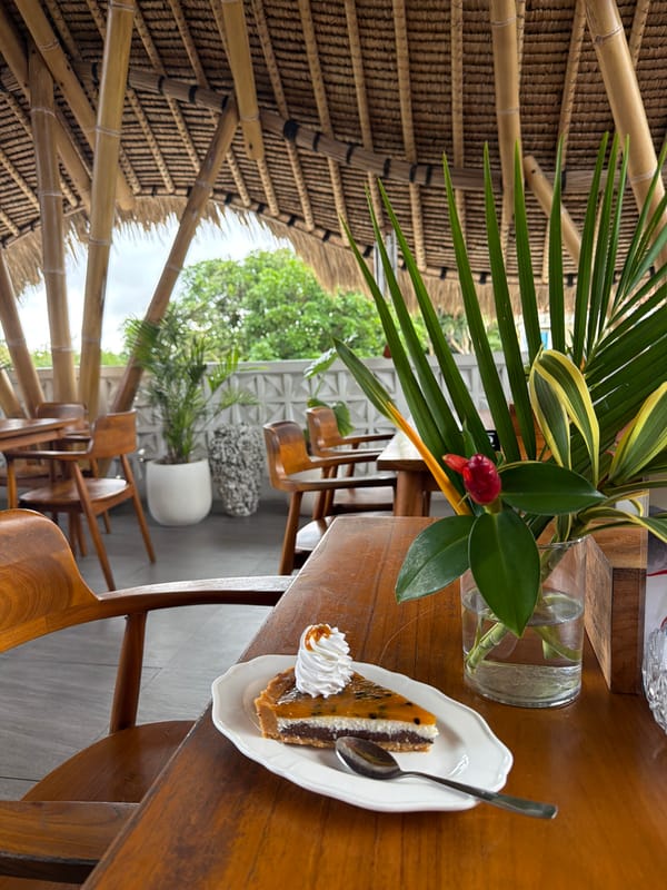 Woman visits traditional bamboo restaurant in Kuta Selatan