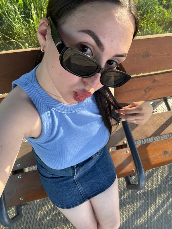 Woman spotted relaxing outdoors, taking mirror selfie in Chaikovsky