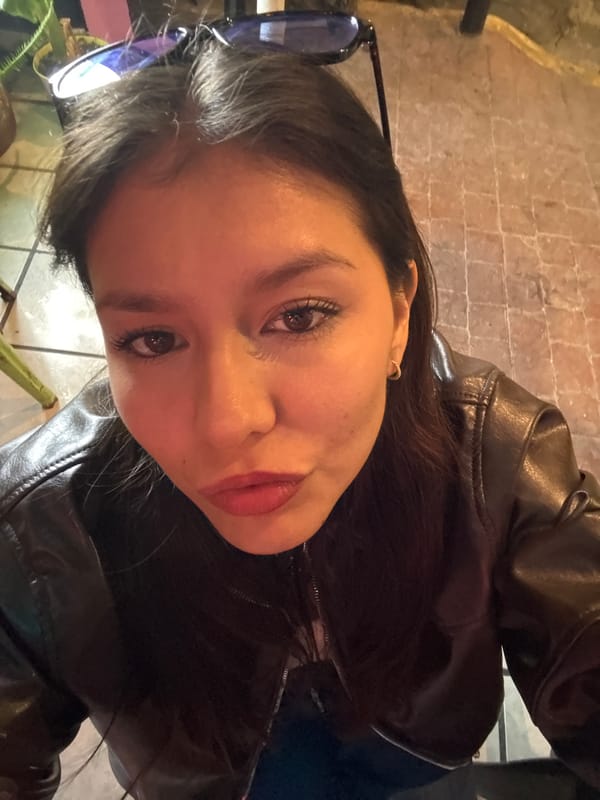 Woman in leather jacket photographed indoors in Cholula