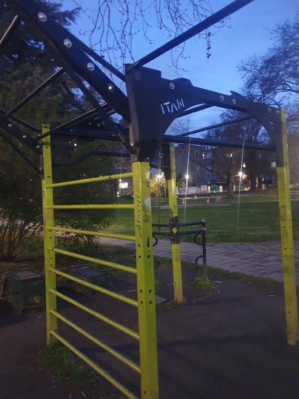 Public park features fitness equipment and bottle cap recycling