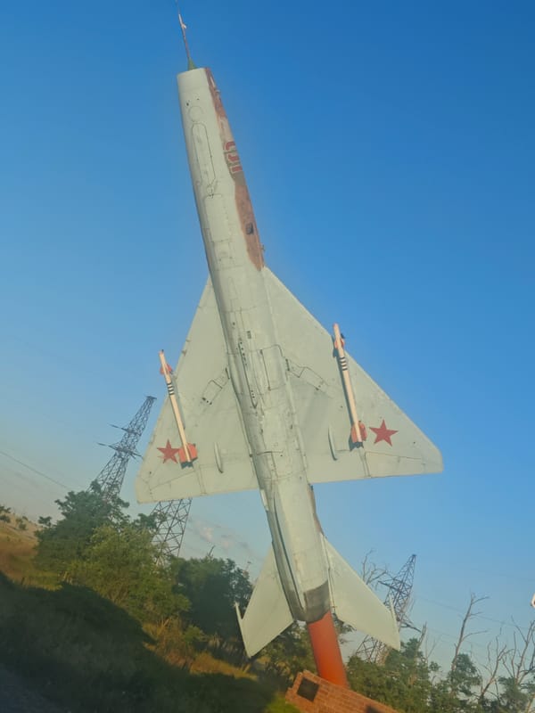 Soviet MiG fighter jet monument displayed on vertical pole