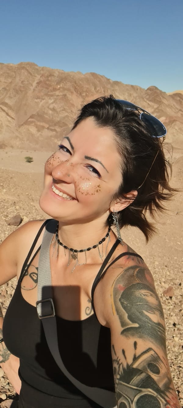 Woman photographed in Eilat desert landscape during early morning