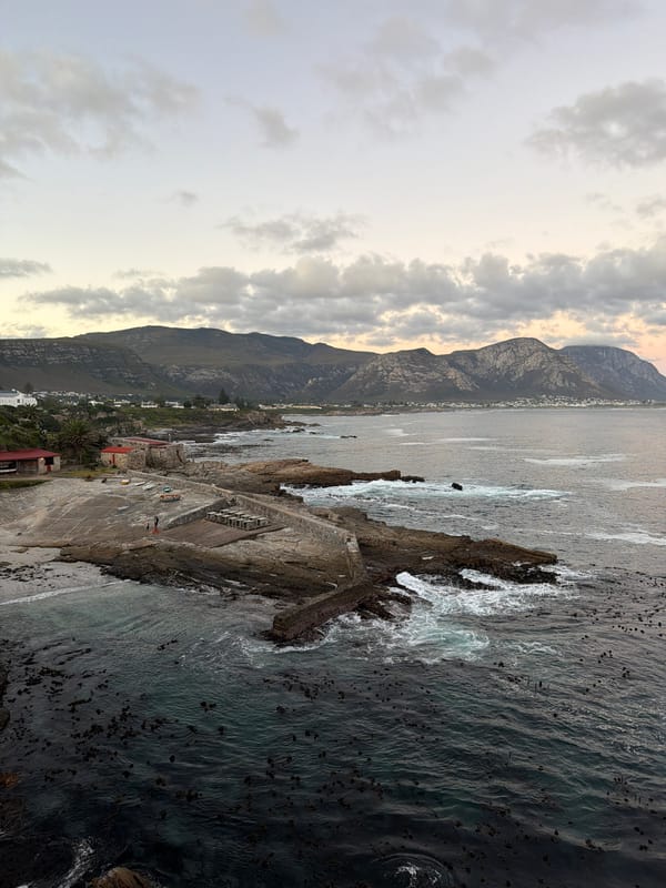 Dramatic coastal scenes documented in Hermanus during twilight hour