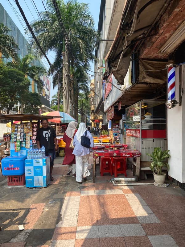 South Jakarta's Blok M strip, food stalls and storefronts in full swing
