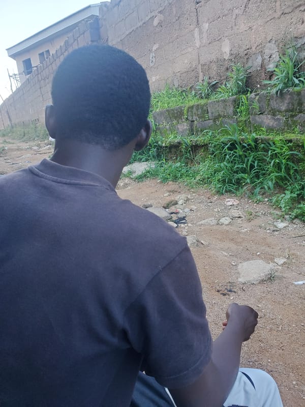 Daily life along rough dirt roads in a low-income urban area