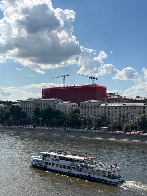 Midday scenes captured along Moscow River showing boats, skyline