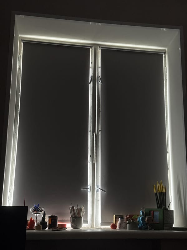 LED-lit window with dark shades observed in Moscow
