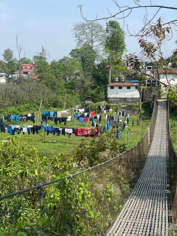 Morning life around suspension bridge in Pokhara, Nepal