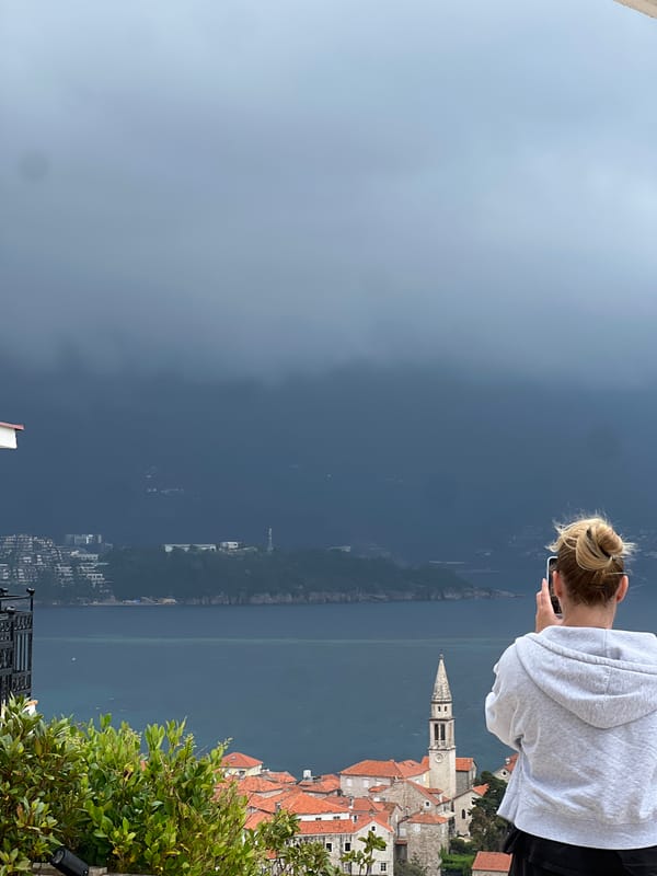 Tourist captures panoramic views of Budva coastline under stormy skies