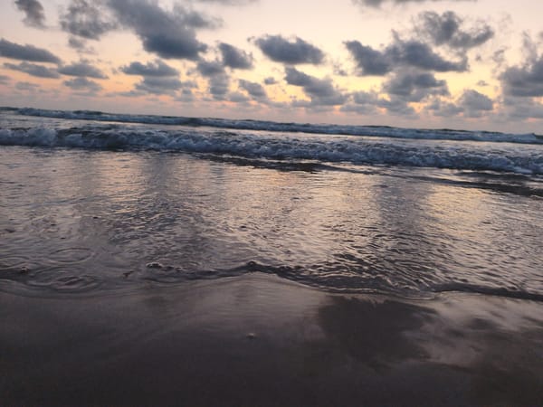 Sunset waves on the Mediterranean shore in Hadera