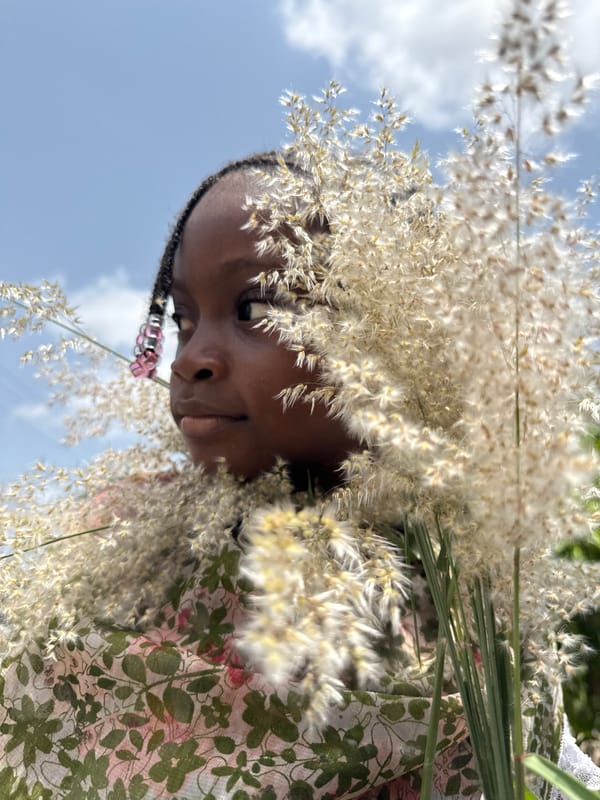 Young girl photographed outdoors in Ado, Nigeria