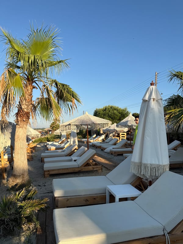 Sunny beach lounge scene in Pallini, Greece