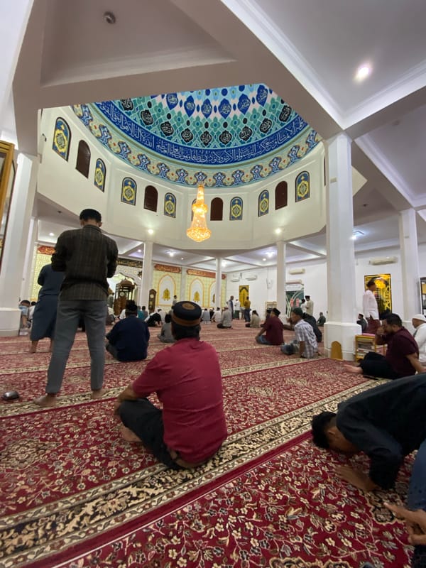 Friday prayers at an ornate mosque in Lhokseumawe, Indonesia