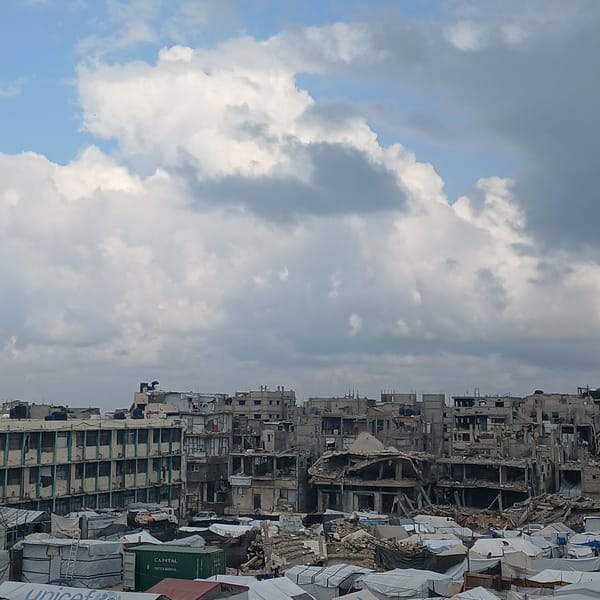 Gaza displacement camps, destroyed buildings, emergency food preparation documented